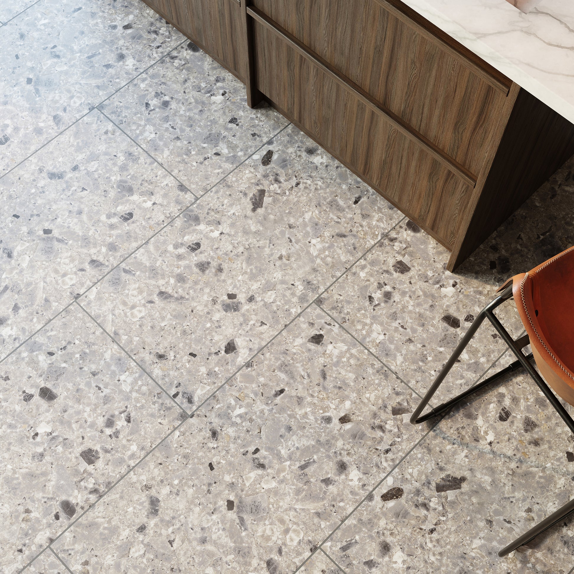 Detail van een luxe terrazzo-look PVC-vloer van Commando Vloeren in een stijlvolle keukenomgeving, benadrukt duurzaamheid en onderhoudsgemak.